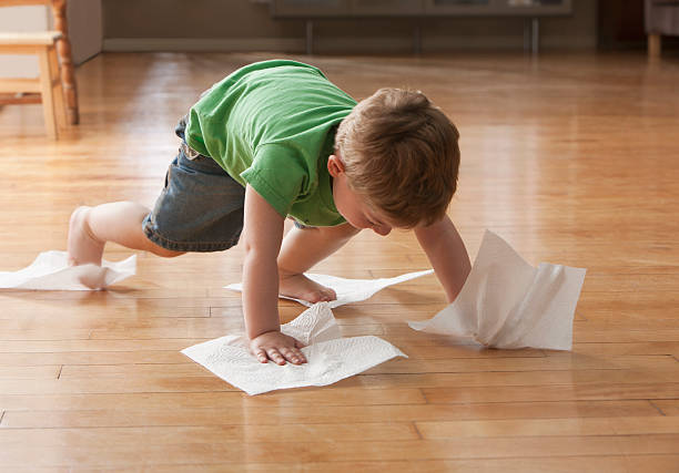 Kid cleaning floor | Corvin's Furniture & Flooring
